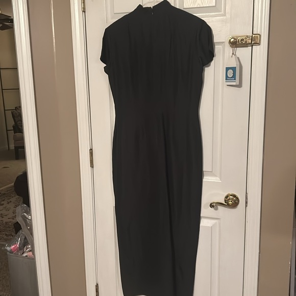 Black oriental dress. Invisible zipper in back shirt sleeve side slits. - Picture 2 of 2